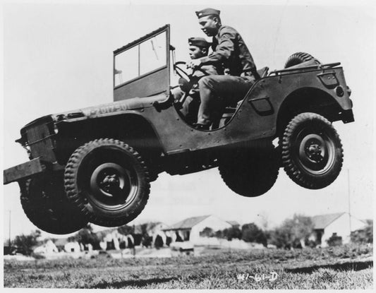 In World War II, what brand of vehicle removed their roofs, which inspired the design of the UTV?